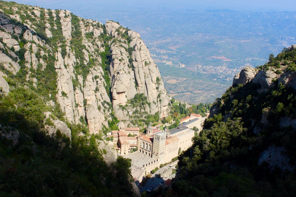 Looking down on the Montserrat Monastery from the mountain peak