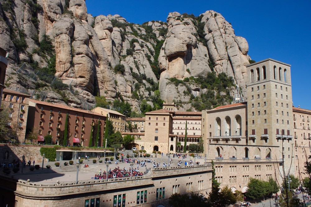 Montserrat monastery with cliffs and bright blue sky