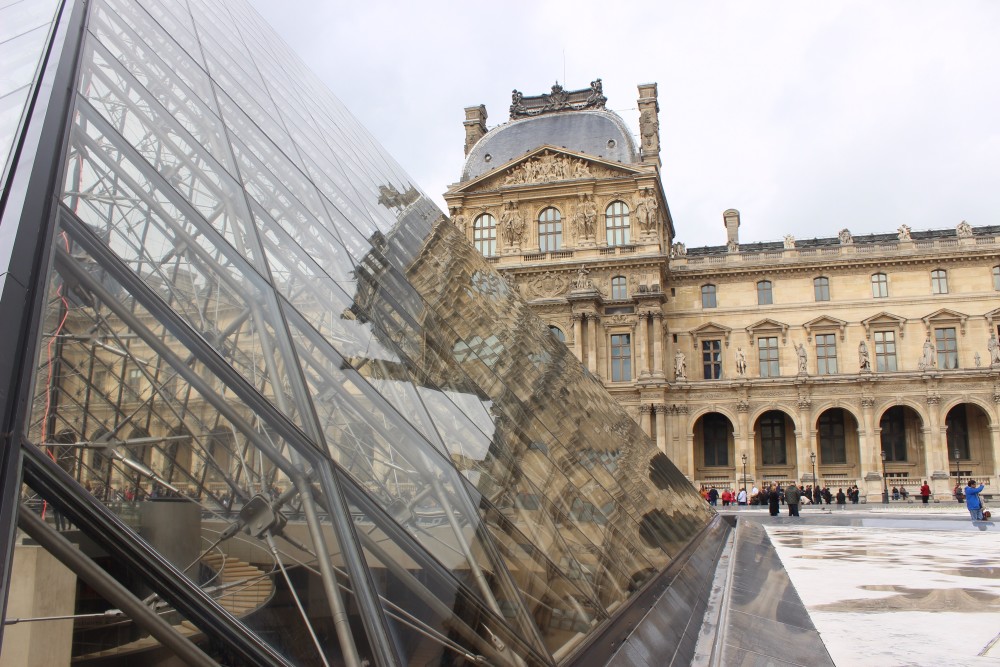 A partial view of the glass pyramid at the louvre in Paris, France