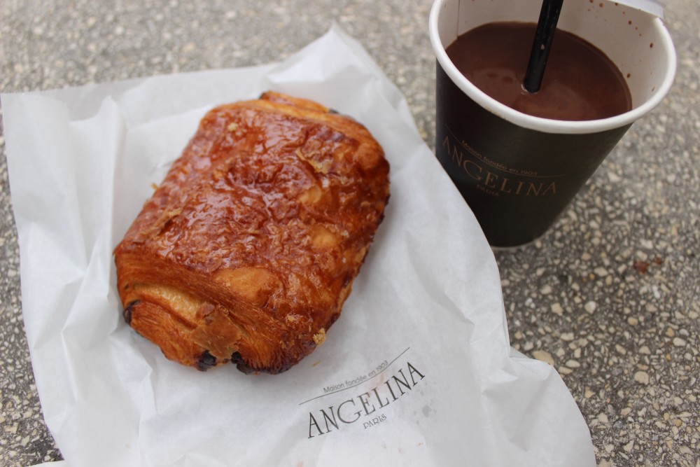 Chocolate croissant and a cup of rich hot chocolate from Angelina in Paris, France