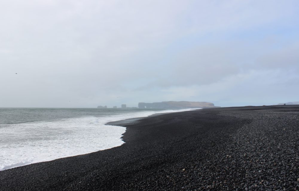 Vik black sand beach on a cloudy and gloomy day