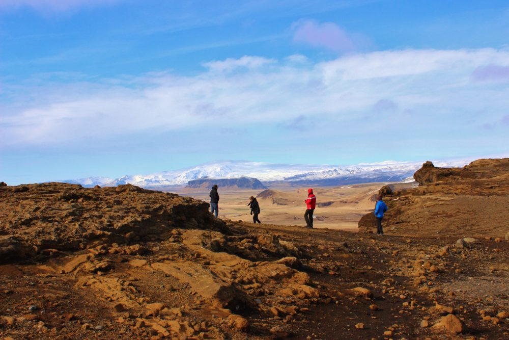 Stunning views from Dyrholaey of mountains with people, Iceland's South Coast
